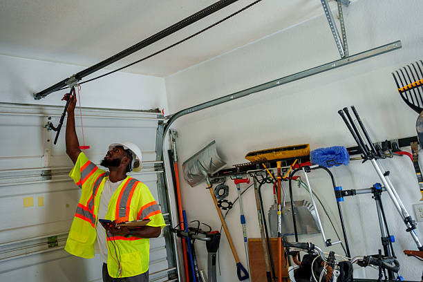 Professional Garage Door Panel Replacement technician working in Essexville, MI